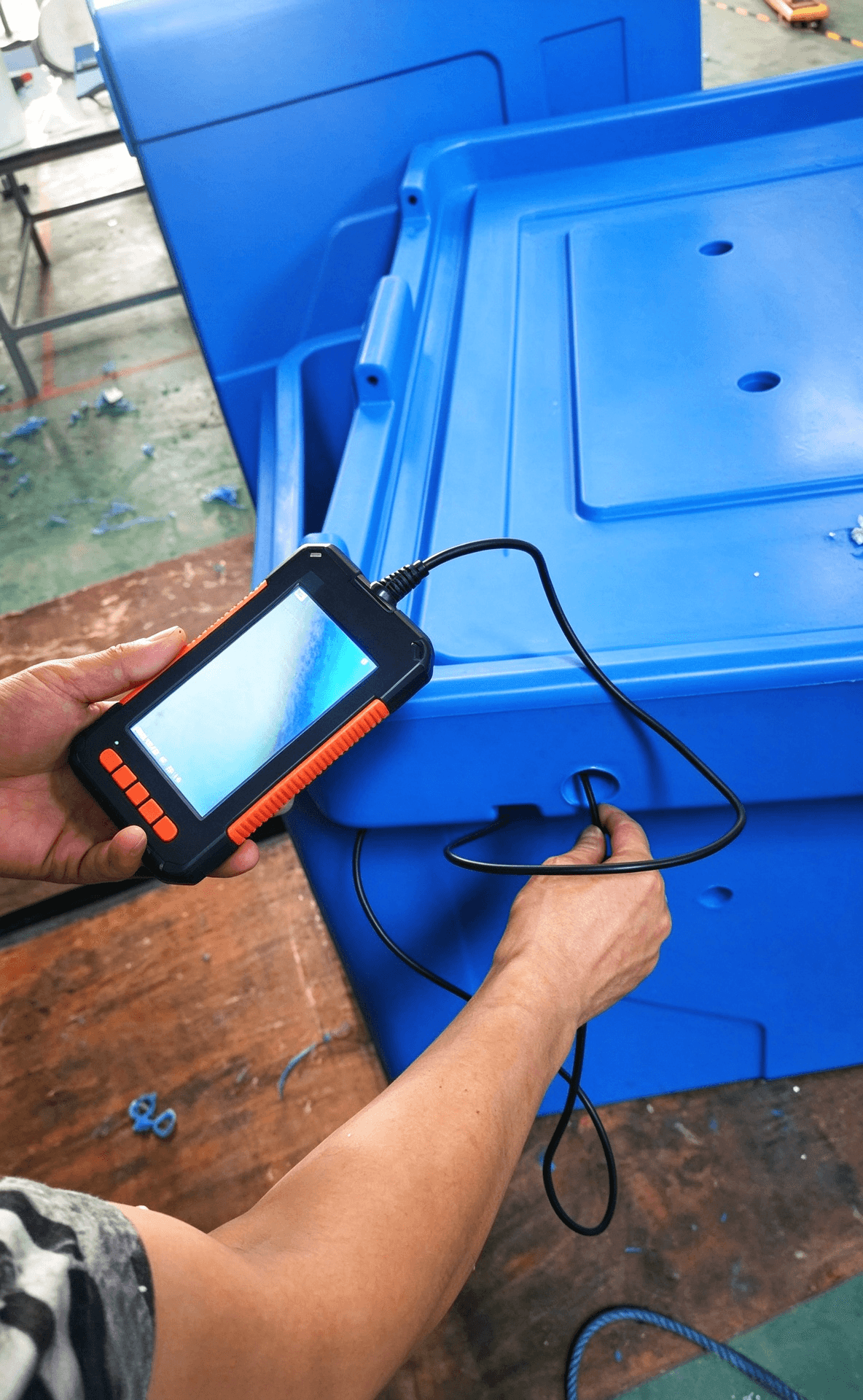 Borescope inspection of dry ice cooler foam